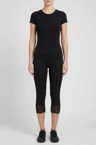 Damskie legginsy 3/4 z koronką i pasem crossover